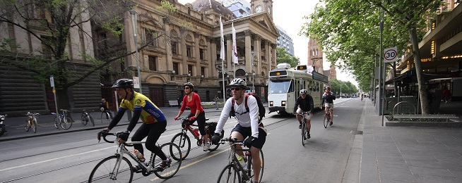 Bike riders outside Melbourne Town Hall